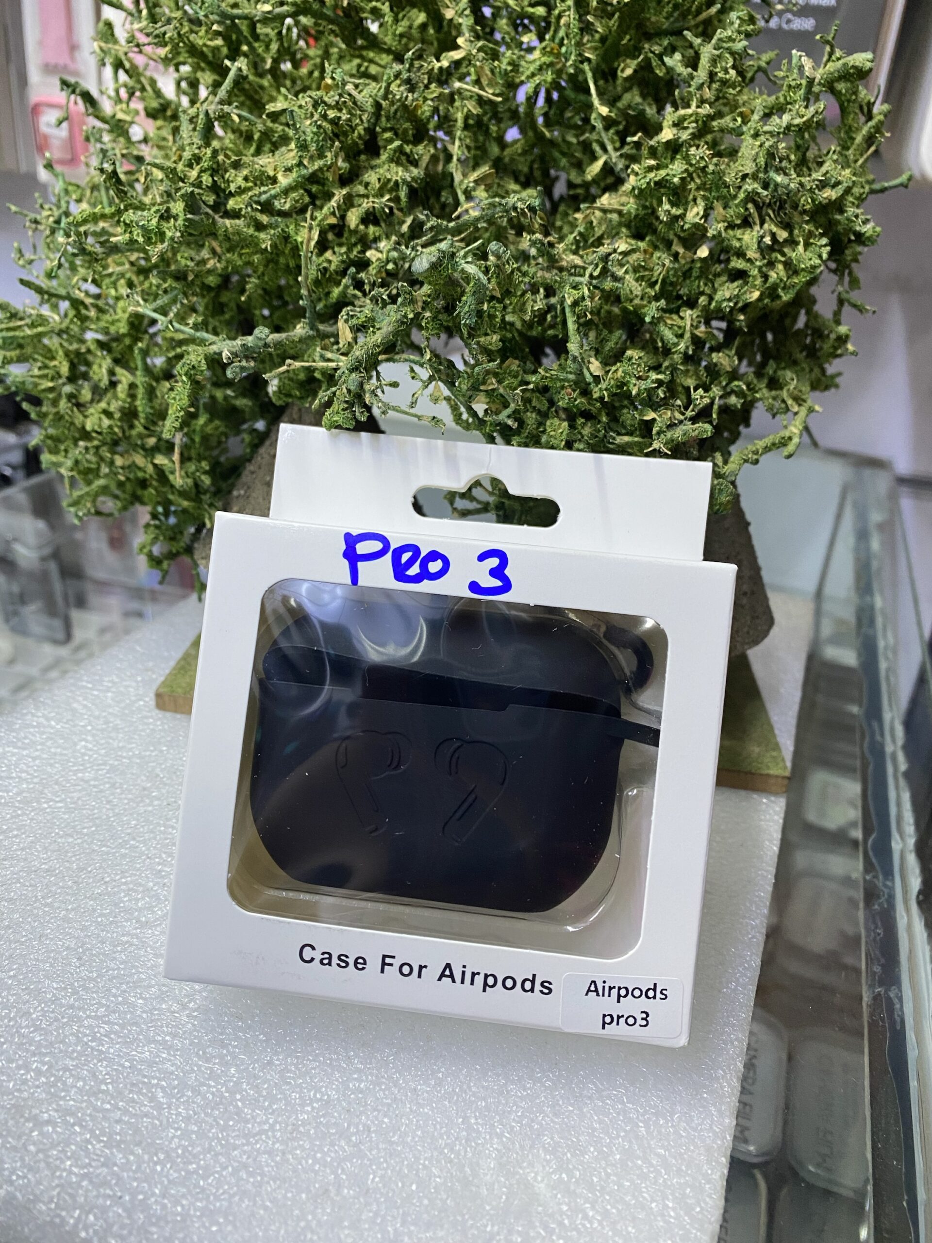 Black silicone case for Apple AirPods Pro 3 headphones.